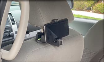 Car hooker holding phone